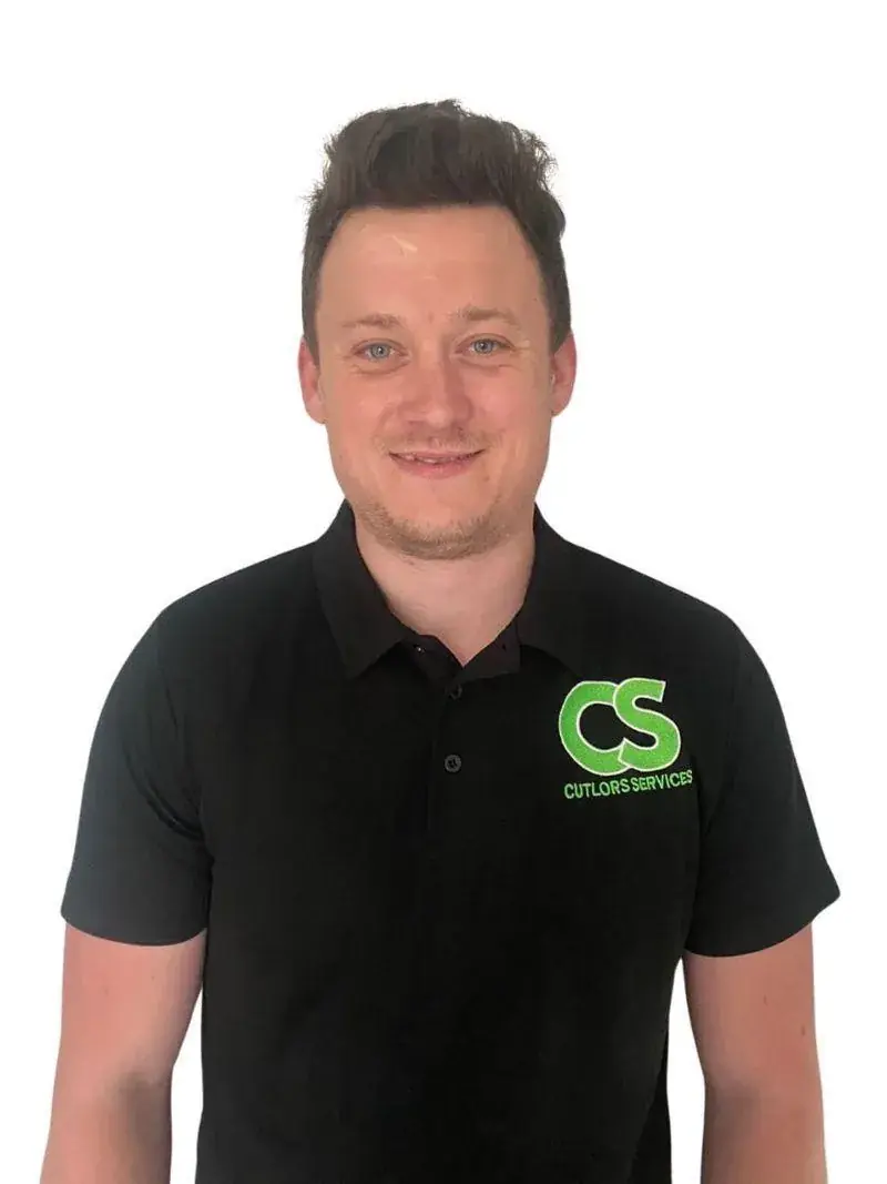 Louis Cuthbertson, owner of Cutlor’s Specialist Cleaning, in a branded black work polo shirt
